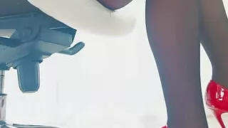 I'm sitting in the office and taking my pantyhose off my pussy with no panties on