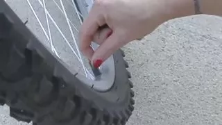 Inked Blonde Muff Diver Seduces the Wandering Cyclist Into Using a Double Ended Dildo