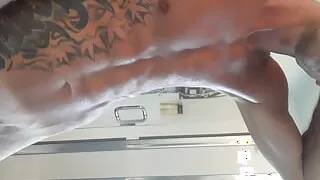 Stroking thick white cock in the shower