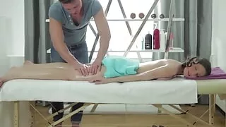 Lovely brunette teen gets massaged and drilled in her trimmed pussy