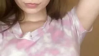 Petite girl showing off her toned body