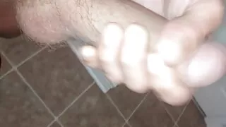 Jerking this thick white cock in the bathroom
