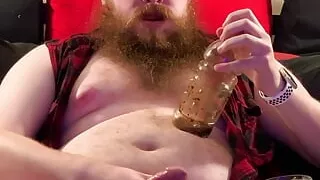 Greased up cock stroking with a toy in my ass