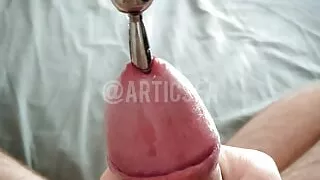 Slow and delicious slide of a beautiful urethral rod