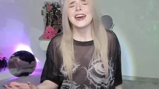 Hot naughty blonde girl singing in sexy outfit