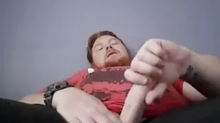 Redhead geek shows his thick cock and moans till he cums