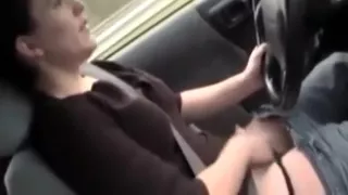 She Fingers Her Pussy While Driving