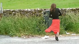 Cath in her button fastening skirts