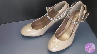 Shoe Fetishism. Splashing On Beige High Heels