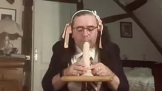 Suck a dildo in school attire with a pink pleated skirt