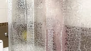 Taking a shower Eva Borisova filmed on a camera out of the corner