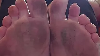 dirty feet , wrinkly soles and crunched toes waiting for a foot fetish to clean them with his tongue,