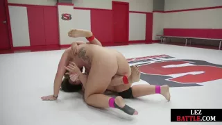 Wrestling lezdom strapon fucks loser babe in wrestling hall