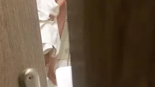 Stepbrother spied on his stepsister in the hotel bathroom and fucked her