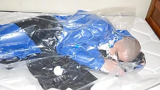 Dec 4 2022 - Vacuum sealed with my PVC Overalls in slvrbrboy1s blue PVC coveralls