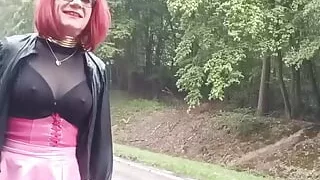 Sissy plays the whore under the rain