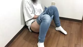 Cute girl who masturbates with half of her jeans down as soon as she makes sure she is home alone.