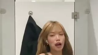 Emma Thai Has Naughty Fun in Airport Toilet