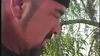 Petite babe in pigtails and tank top takes stiff dick and facial outdoors