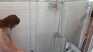 Capturing my girlfriend on film stripping and showering in the bathroom