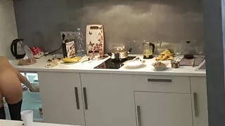 Smutty brunette cooks dinner without any clothes on