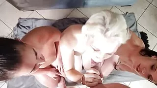 Three girls sucking and jerking cock in point of view while spitting on each other