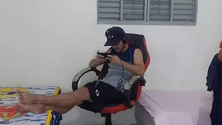Stepsister changes near her stepbrother and he ends up fucking her on the gaming chair