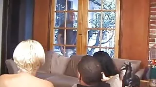 Orgy play with 2 sexy females and huge cocks on the sofa