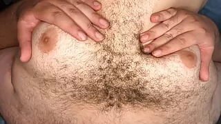 Chubby gay bear shaking moobs + playing with big nipples