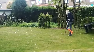 Walking Through The Garden With Crutches And Smoking A Cigarette At The End