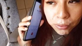 She sucks me off while talking to her husband on the phone
