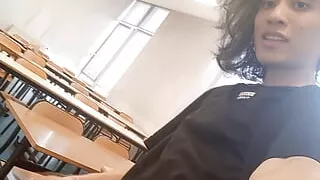 Cum at school, this horny student twink wanks his smooth cock and squirts jizz riskyly at school in a classroom on classmate des