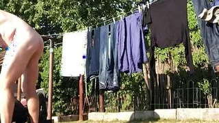 Hanging the washing on the line with happy ending