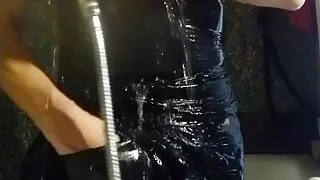 Trans girl masturbates in the bathroom wearing black pantyhose, miniskirt, dress and high heels