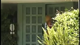 Kinky blonde with sexy tits and red dress gets fucked in living room