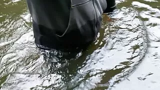 Walking into a river fully clothed and piss wet
