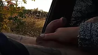 my wife jerks off my dick in the car in nature close up
