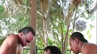 Hot black beauty gets smashed from the rear while giving head