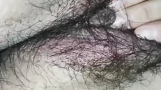 It's Sunday morning and my pussy wants to be touched peacefully so I take my hand towards my hairy pussy