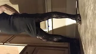 Sissy wearing a dress outdoors playing with a dildo