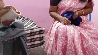 Tamil aunty was sitting on the chair and working I gently stroked her thigh and sucked so many breasts and had hot sex with her.