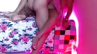 The boyfriend gave anal fingering to the excited sister-in-law while lying upside down in the bed.