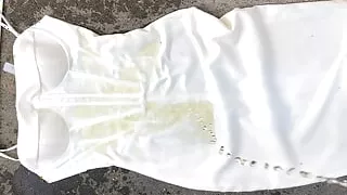 Cell Phone Video of Gorgeous White Satin Gown getting Peed on