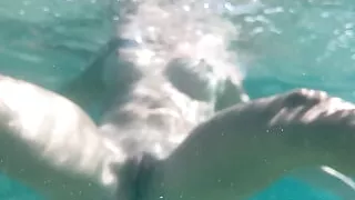 Swimming naked on a public beach