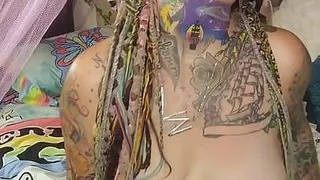 Sexy Tattooed MILF Playing with Tight Little Pussy