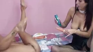 Erotic babe dildo fucking her partner in a lesbian session