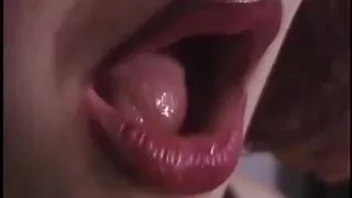 Round-assed leather BDSM hottie whips kneeling white slave guy's ass and balls