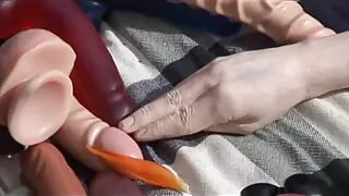 Horny blonde whore gets fucked by two guys on a picnic