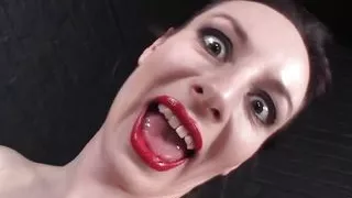 Brunette masturbates in nylons and suspenders on gyn chair