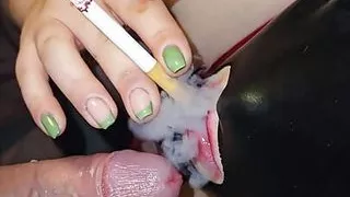 I smoke a cigar and a dick together.  it turns him on.